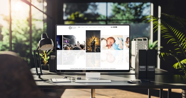 Site internet du photographe Erik Ourdi sur un ordinateur
